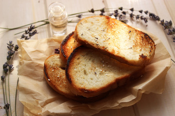 toast in the background with sprigs of lavender