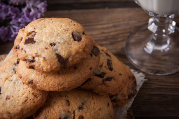 Stack of cookies with glass of milk
