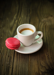 Pink macaroon espresso coffee with milk