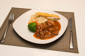 Pork stew with pasta