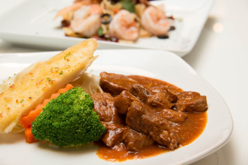 Pork stew with pasta