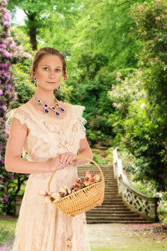 Victorian Woman In Garden With Roses