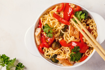 Asian noodles with vegetables and chicken.