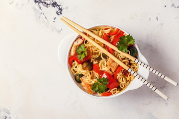Asian noodles with vegetables and chicken.