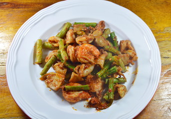 spicy stir fried mixed seafood with mushroom curry on dish