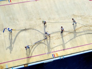 Naklejka premium Workers on Piers