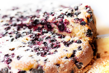 Tasty pie with blueberries on wooden table