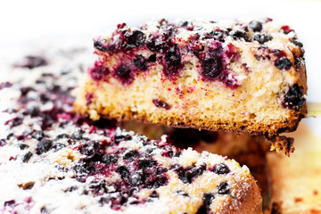 Tasty pie with blueberries on wooden table