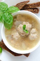 buckwheat soup meatballs white plate bread