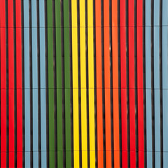 The set of all colors of the rainbow. Vertical rectangles of metal