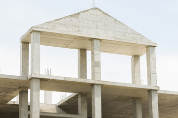 Unfinished house with a monolithic concrete constructions