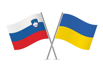 Slovenian and Ukrainian flags. Vector illustration.