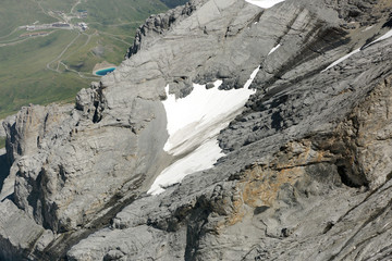 Patches of snow in Monch alps mountain in Jungfrau region