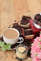 Obraz na płótnie Canvas Coffee grinder with coffee beans and cup espresso.