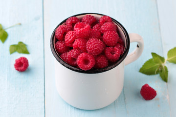 Raspberries in a mug