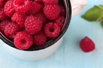 Raspberries in a mug