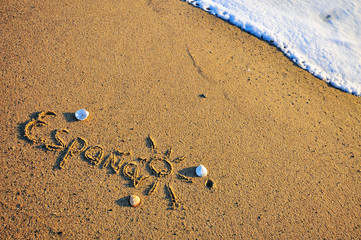 Spain sign on the beach