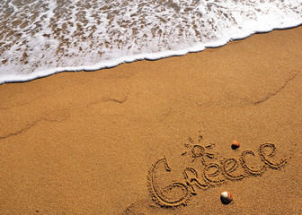 Greece sign on the beach