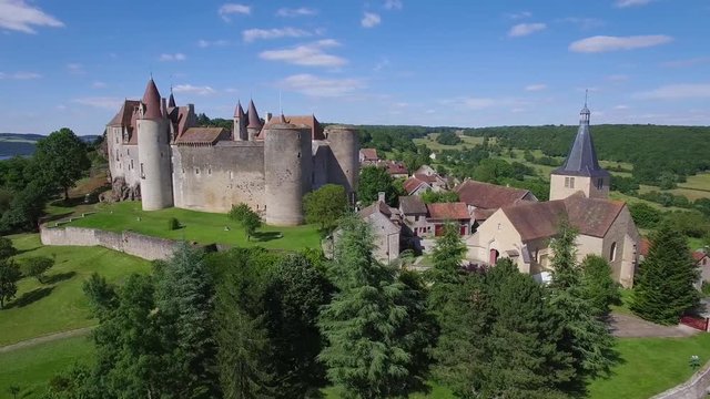 France, Burgundy, Cote d'Or, Aerial view of Chateauneuf en Auxois, or Chateauneuf, labelled Les Plus Beaux Villages de France (The Most beautiful Villages of France), HD Movie (1920X1080)