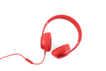 Red headphone on white baclground