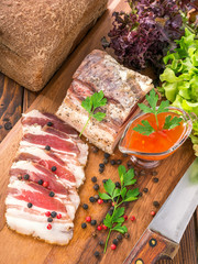 salty bacon on a cutting board