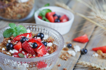 Dessert with fresh berries, cottage  cheese, granola and berries