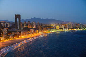 Night view of the coastline in Benidorm with city lights