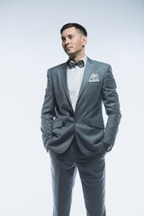 Portrait of a elegant handsome business man on white background