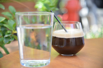 Freddo instant coffee on ice cubes Greek summer drink