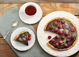 Cake with raspberries and chocolate