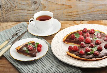 Cake with raspberries and chocolate