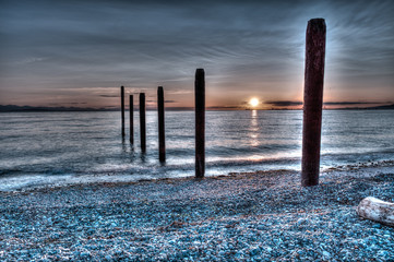 Sunset over the pillings at Point Roberts, Washington state, USA	