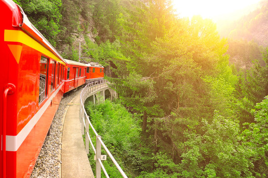 Passenger train at sunset.