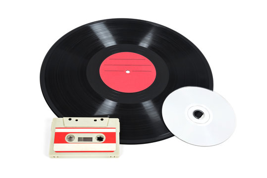 Music storage devices - vinyl record, analog cassette and CD