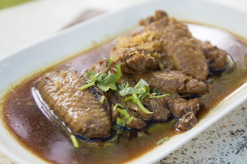 chicken wings stewed on the plate