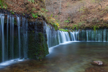 Shiraito Waterfall in autumn season ,  is located in the forests north of downtown Karuizawa , Japan