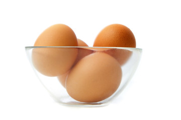 Brown eggs in a bowl.