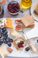 serving cheese board with wide selection