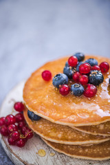 pancakes with redcurrant and berries