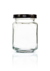 Clear glass bottle with black cap isolated on white background