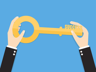 hands of businessman or manager holding a golden key with word success