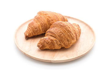 butter croissant on white