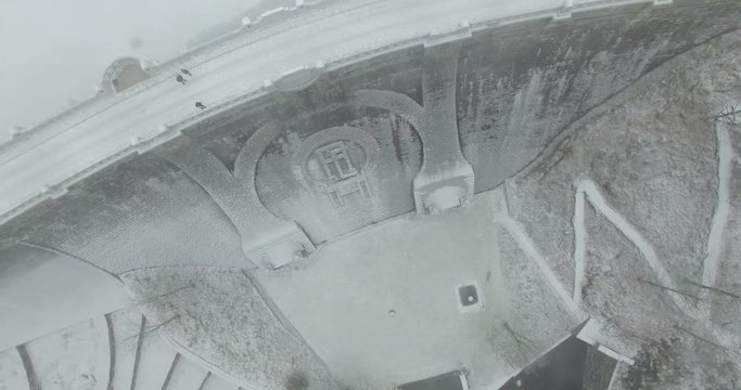 Aerial: The reservoir and bridge of Spindler Mill, Czech Republic in winter