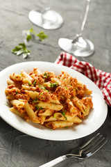 Pasta with chicken and tomato sauce