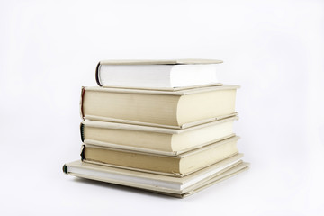 Stack of books on a white background