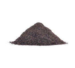 Small heap of Ceylonb lack tea on white background