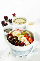 Breakfast bowl with fruits, seeds and berries