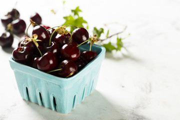 Fresh cherries in box