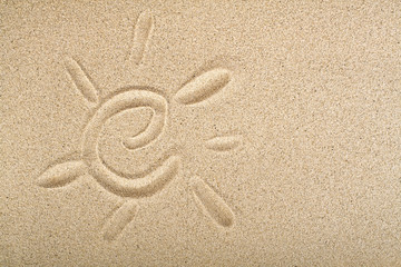 Sand sun print on a beach in a summer sunset