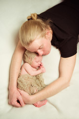 Caring parent's hands - father and newborn. Sweet dream
